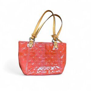 Coach Peyton Signature Embossed Patent Leather mini Tote. vibrant coral glossy